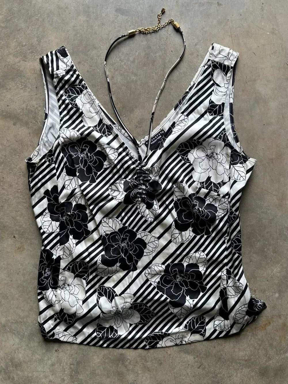 Black and white striped floral top with a V-neck and adjustable halter strap